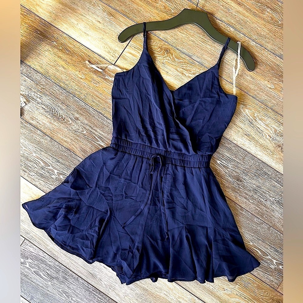 🛍️ Trixxl  navy blue wrap front  romper shorts . Excellent condition.New